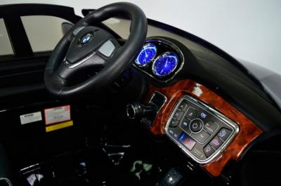 Детский электромобиль Kids Cars KT6555 BMW X6 Special с кожаным сиденьем